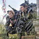 Illustration for article titled Tom Cruise and Emily Blunt don guns and armor for emAll You Need is Kill/em